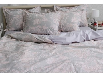 Delicate bed linen made of natural Turkish cotton. The design is made with ornate patterns of lilac color, which are located on a smoky gray canvas. Exquisitely beautiful bed linen, suitable for a gray interior, as well as in pink tones. The set is produc